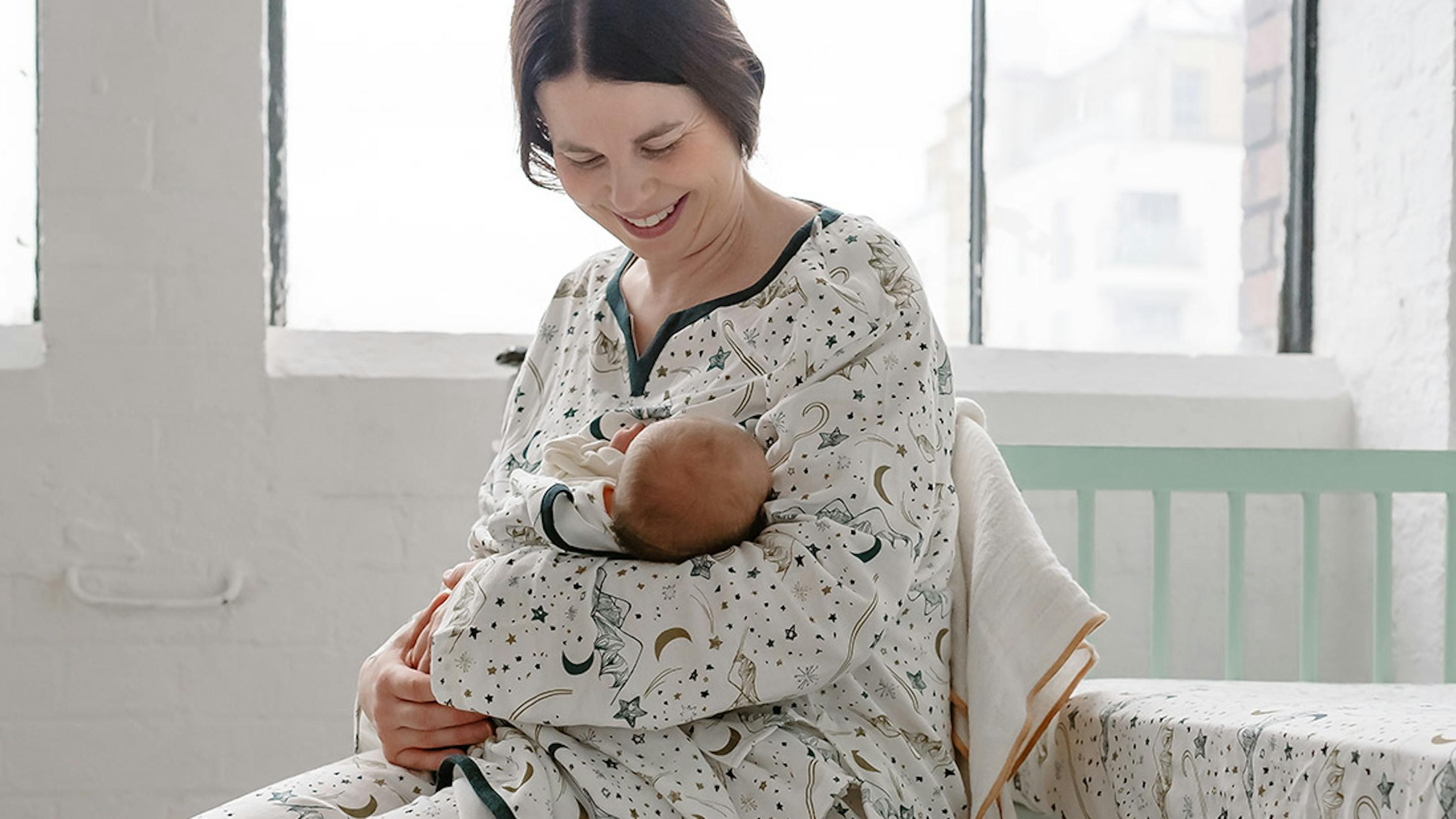 Mom with her newborn in Nest Designs nursing PJs